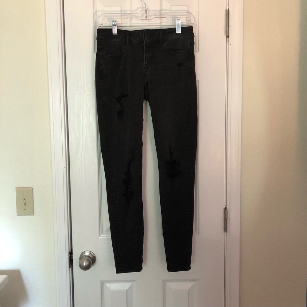Distressed black American Eagle skinny jeans